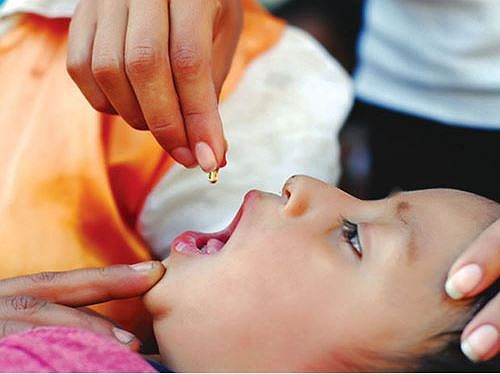 Con đang ốm có nên cho uống vitamin A ở xã phường không? - Ảnh 1.